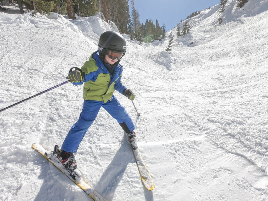 Boy skiing down a slope at Solitude