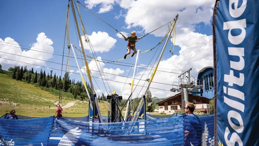 child on bungee trampoline