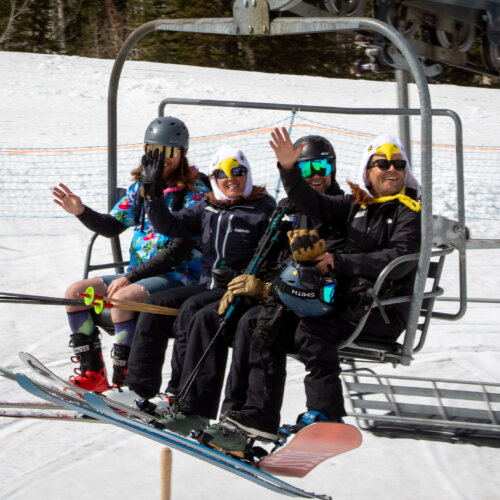 4 employees ride the last chair as Eagle Express retires.